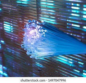 fiber optics network cable for ultra fast internet communications, thin light threads that move information at high speed.