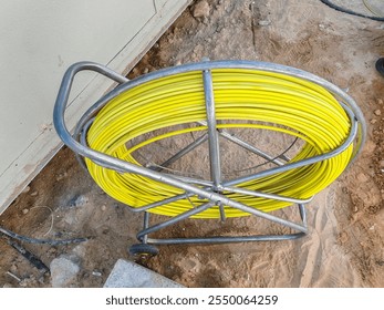 Fiberglass wire cable, Push Pull yellow rod wire. 
Cable pulling duct rodder or panel, yellow Fiberglass duct rudder for cable roller cage.
Yellow color cable Inside the steel Rod.