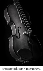 fiddle 4 strings close-up view black background 