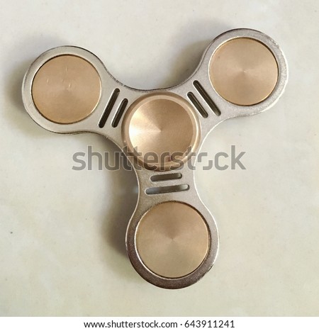 Fidget hand spinner finger tips gyro stress reliever toy tri-spinner whing for autism and ADHD kids.