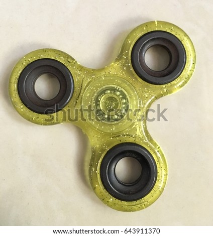 Fidget hand spinner finger tips gyro stress reliever toy tri-spinner whing for autism and ADHD kids.