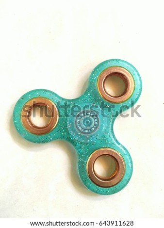 Fidget hand spinner finger tips gyro stress reliever toy tri-spinner whing for autism and ADHD kids.