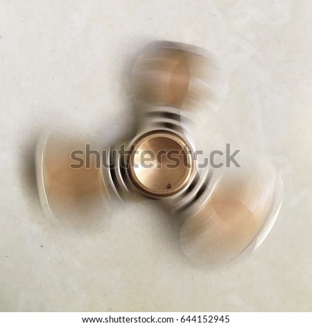 Fidget hand spinner finger tips gyro stress reliever toy tri-spinner whing for autism and ADHD kids.