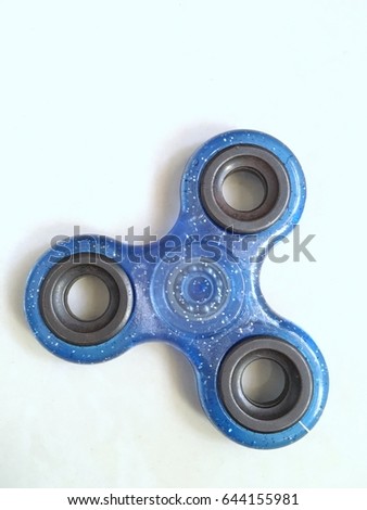 Fidget hand spinner finger tips gyro stress reliever toy tri-spinner whing for autism and ADHD kids.