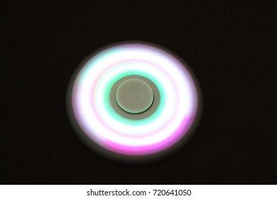 fidget spinner in a black background