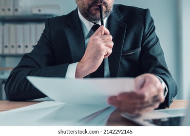 Fiduciary, Agent Carefully Reading Business Papers In Office, Selective Focus