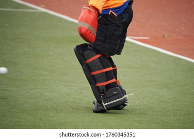 Field hockey goalkeeper on a green grass. - Powered by Shutterstock