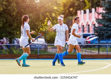 Field Hockey Team Players Cheer Each Other With Success Attack And Goal Score.