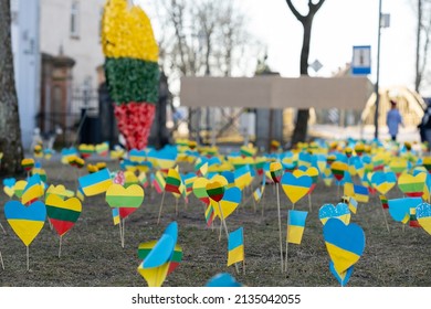 The Field In Lithuania With Mini Flags Of Ukraine And Lithuania For Support Ukraine In War