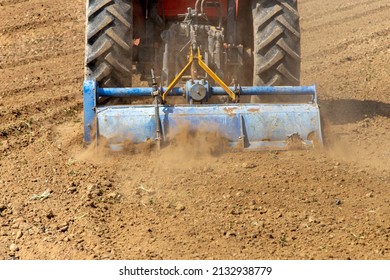 Field Preparation By Rotary Tiller Tractor