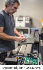 Field Service Maintenance Engineer Technician Electrician Inspect And Control Machine Hardware And Software System With Laptop Computer. Electric Installation