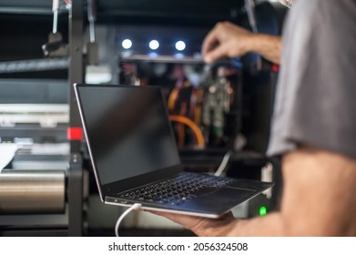 Field Service Maintenance Engineer Technician Electrician Inspect And Control Machine Hardware And Software System With Laptop Computer. Electric Installation