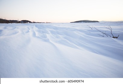 A Field Of Snow In Winter Season. Beautiful Effect