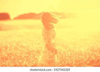 field wheat sunset girl, summer landscape, outdoor activity concept abstract freedom woman