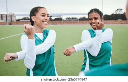 Field, women and friends stretching, exercise and warm up with support, wellness and training. Hockey, group and girls with workout, competition and match with health, cardio and smile with energy - Powered by Shutterstock