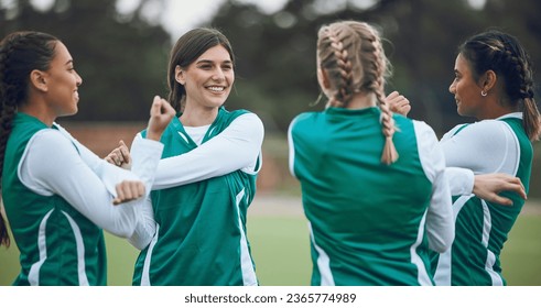 Field, women and team stretching, fitness and warm up with exercise, wellness and sports. Hockey, group and girls with workout, competition and match with health, training and support with energy - Powered by Shutterstock