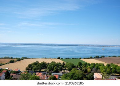 Fields In Different Colors, With Lake Vättern In The Background