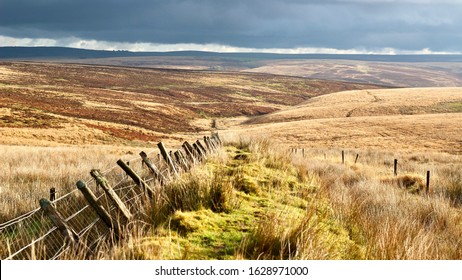 Fields And Moors In Exmoor Dark Sky Area With Dark Grey Rain Clouds Landscape