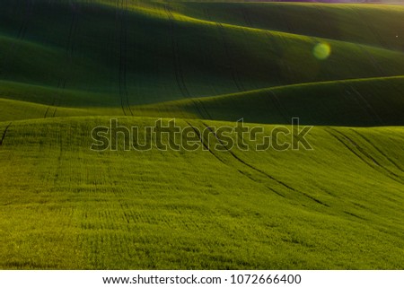 Similar – beautiful hills at sunset