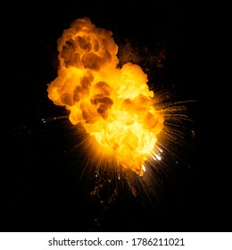 Fiery Bomb Explosion With Sparks Isolated On Black Background. Bomb Detonation Photo