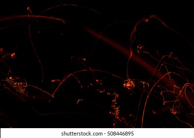 Fiery Embers Falling In Darkness Background