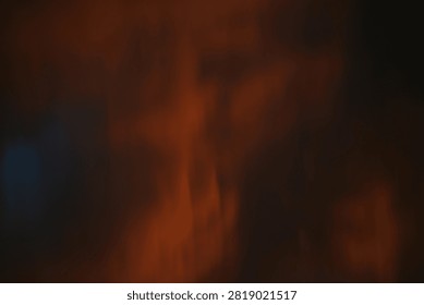 Fiery Red Orange Dramatic Clouds In Sunset Sky Background. Fiery red and orange dramatic clouds in the sky during intense sunset. Moody and dramatic atmosphere. Perfect for background, weather, nature and apocalyptic concept. High resolution.