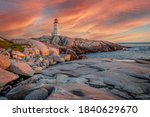 A fiery sky over the lighthouse at Peggy’s Cove in Nova Scotia