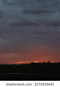 Fiery sunset with dark clouds