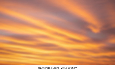 Fiery Sunset Sky with Dramatic Colors and Cloud Streaks Atmospheric and vibrant.