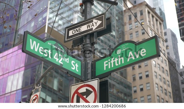 Fifth Avenue street sign\
in New York
