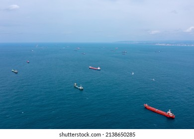 Fifty Cargo And Container Ships Anchored Close To Port Due To Worldwide Maritime Congestion Crisis, Aerial View.