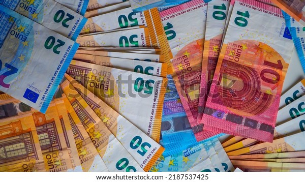 fifty euro, ten euro, twenty euro banknotes.\
Inflation. Expenses and income. Finance and savings. Money\
counting. Cash. Crisis Business. Central bank. Euro Union. economic\
war. Salary Currency.\
crypto