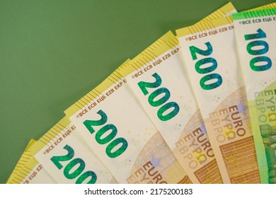 Fifty Euros Banknotes On A Green Background.Euro Currency.Spending And Income In European Countries.Euro Currency Exchange Rate.Budget Allocation. Bundle Of Money.Bundles Of Money.