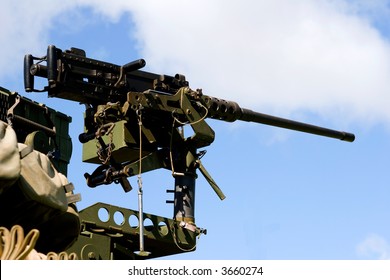 fifty-cal machine gun standing at the ready position for combat