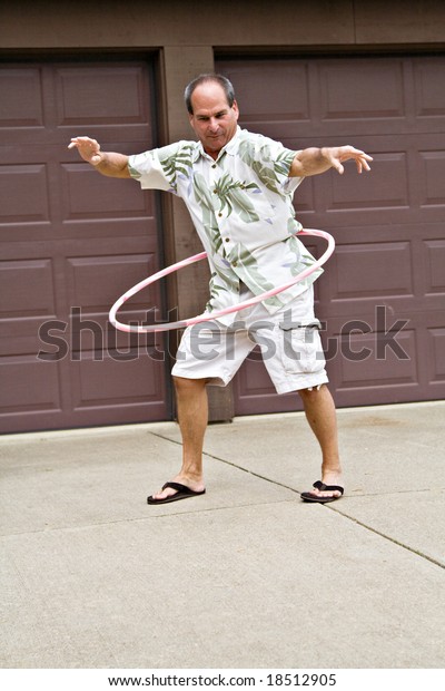 Fiftyfive Year Old Man Plays Hula Stock Photo Edit Now