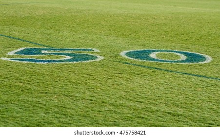 Fifty-yard Line Painted On Green Grass, Australian AFL Football