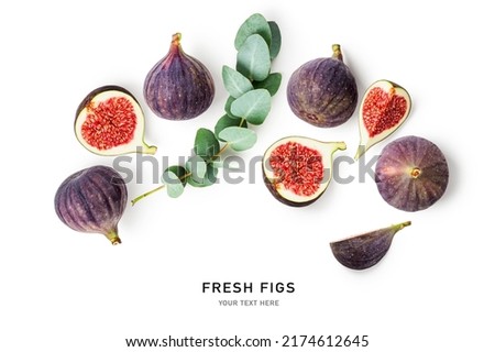 Fig fruit creative layout isolated on white background. Healthy eating and dieting food concept. Tropical fruits and leaves composition. Top view, flat lay. Design element