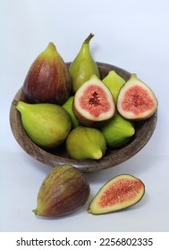 The fig is a fruit of the tree: Fig Tree (Ficus-carica) From the Moraceae family, similar to a pear.
 - Shutterstock ID 2256802335