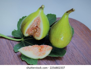 The fig is a fruit of the tree: Fig Tree (Ficus-carica) From the Moraceae family, similar to a pear.
 - Shutterstock ID 2256802337