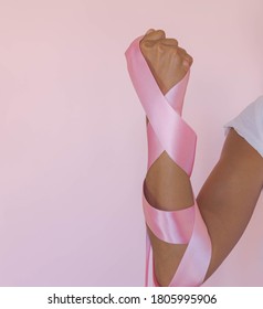 A Fight Against Breast Cancer Symbol On Pink Background. Strong Women, Pink Ribbon.