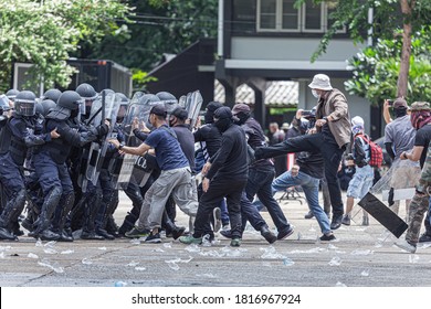 The fight between citizens and the police in the insurgency,uprising,People causing rioting against the government. - Shutterstock ID 1816967924
