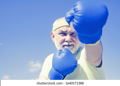 Fighter. Boxer With Boxing Glove. Senior Man In Gloves Beats Punching Bag. Boxing. Older Man Boxing. I Love Boxing. Senior Cool Man Fighting