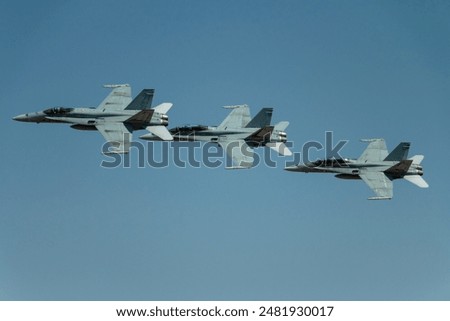 Fighter jet flying over an airfield