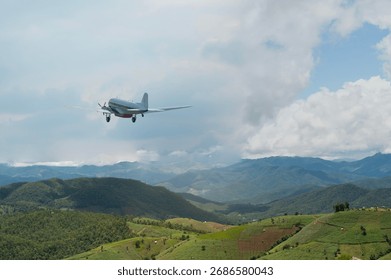 Fighter jet flying through cloudy blue sky on background with copy space
