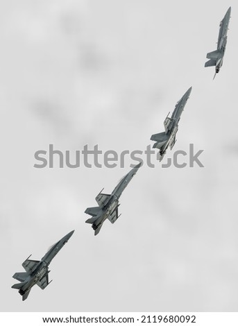 Fighter jet pulling up during a display flight at a airshow in Belgium. This maneuver requires a huge amount of thrust from the engines of the aircraft. 