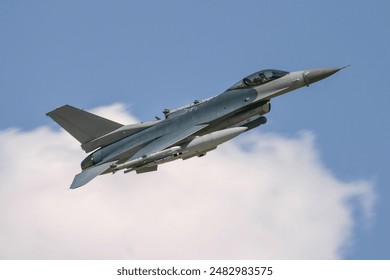 A fighter jet returns from a combat training mission. Military aircraft flying operational sorties. Fighter pilots at work. 
