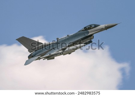 A fighter jet returns from a combat training mission. Military aircraft flying operational sorties. Fighter pilots at work. 