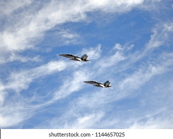 Fighter jets among clouds
