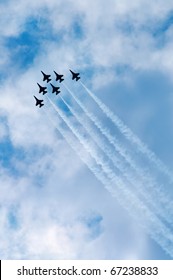 Fighter Jets In Delta Formation Leaving Contrails