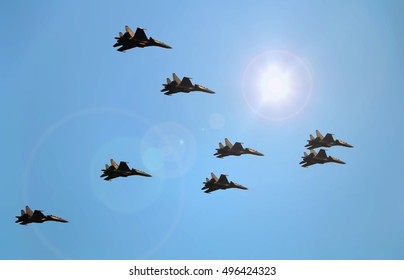 Fighter jets flying under blue sky